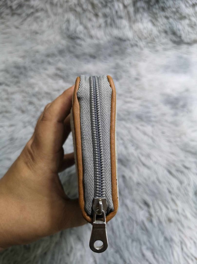 Zipper Closure Long Wallet With Card & Coin Compartment (Category: Wallets & Card holders) located in Santa Cruz. Submitted by jmy_surplus.2 (Listing ID 1462685592, Image 2). Description: Size ; L - 4.5 W - 8 Color ; Grey , Blue Type ; Wallet Brand ; No brand Material ; Synthetic Style ; Light grey With Blue Long Wallet LR 129 JMY 5 Batch #222.