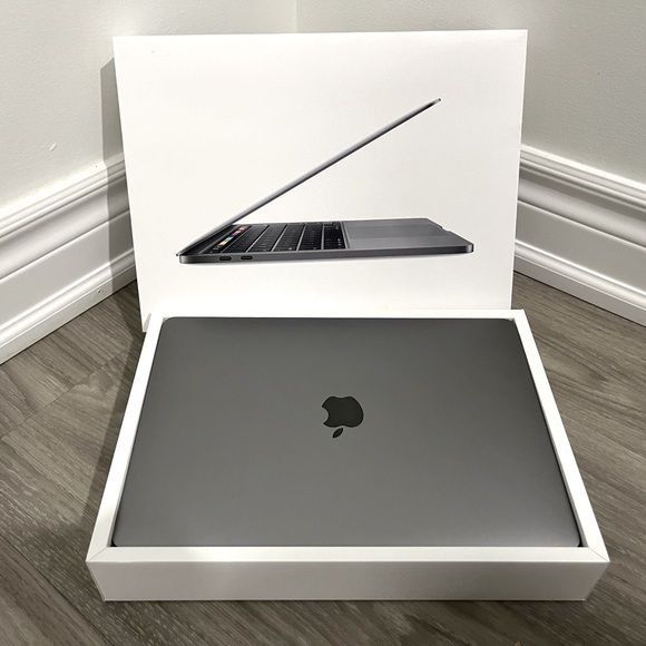 2020 Apple MacBook Pro Laptop with touch pad - Space Gray (Category: Laptops & Notebooks) located in Caloocan City. Submitted by wilsongadgetworld (Listing ID 1459276637, Image 1). Description: - Space Gray MacBook Pro - Comes in original box - Sleek and powerful design - Ideal for work and creative tasks - Reliable Apple device 16GB RAM 512 STORAGE.