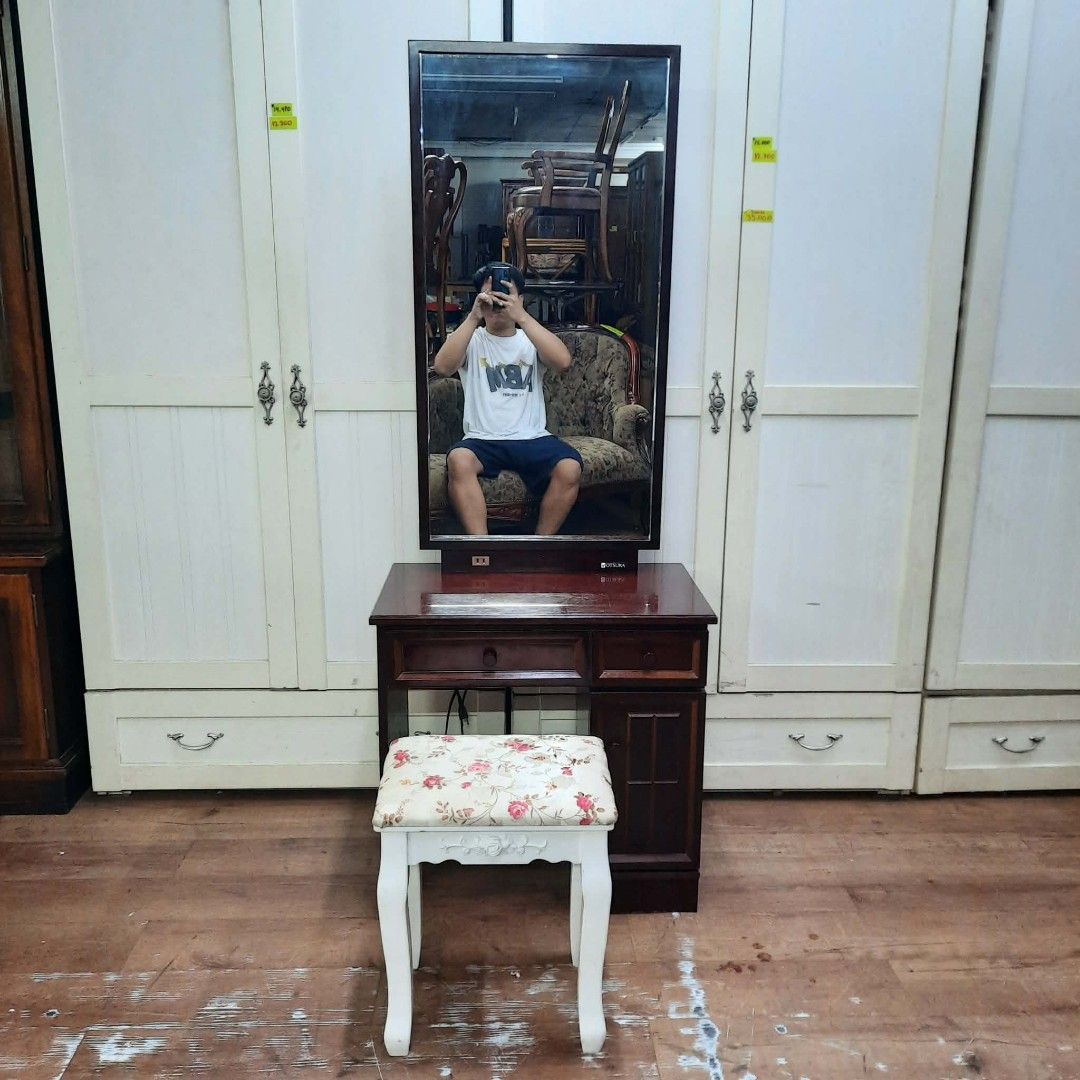 2nd hand vanity dresser set (Category: Tables & Sets) located in Manila. Submitted by ivan_furnitures421 (Listing ID 1459230947, Image 3). Description: - Second-hand vanity dresser set - Includes tall mirror and floral upholstered stool - Rich, dark wood finish - Features drawers and a cabinet for storage - Located in Tambo, Parañaque.