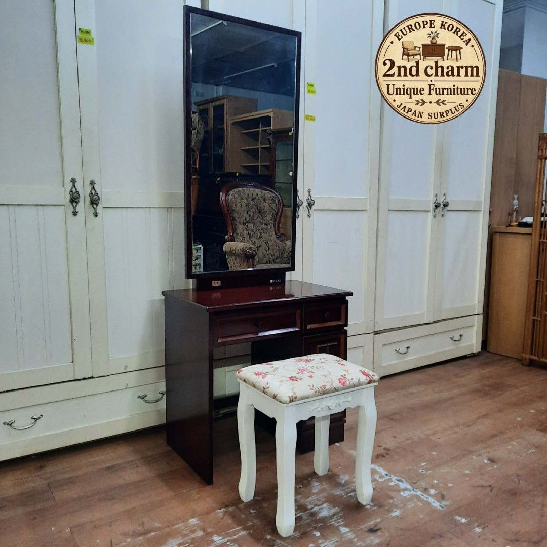 2nd hand vanity dresser set (Category: Tables & Sets) located in Manila. Submitted by ivan_furnitures421 (Listing ID 1459230947, Image 1). Description: - Second-hand vanity dresser set - Includes tall mirror and floral upholstered stool - Rich, dark wood finish - Features drawers and a cabinet for storage - Located in Tambo, Parañaque.