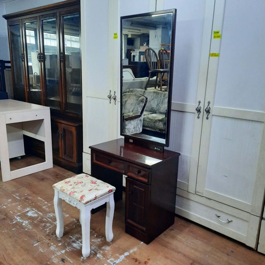 2nd hand vanity dresser set (Category: Tables & Sets) located in Manila. Submitted by ivan_furnitures421 (Listing ID 1459230947, Image 2). Description: - Second-hand vanity dresser set - Includes tall mirror and floral upholstered stool - Rich, dark wood finish - Features drawers and a cabinet for storage - Located in Tambo, Parañaque.