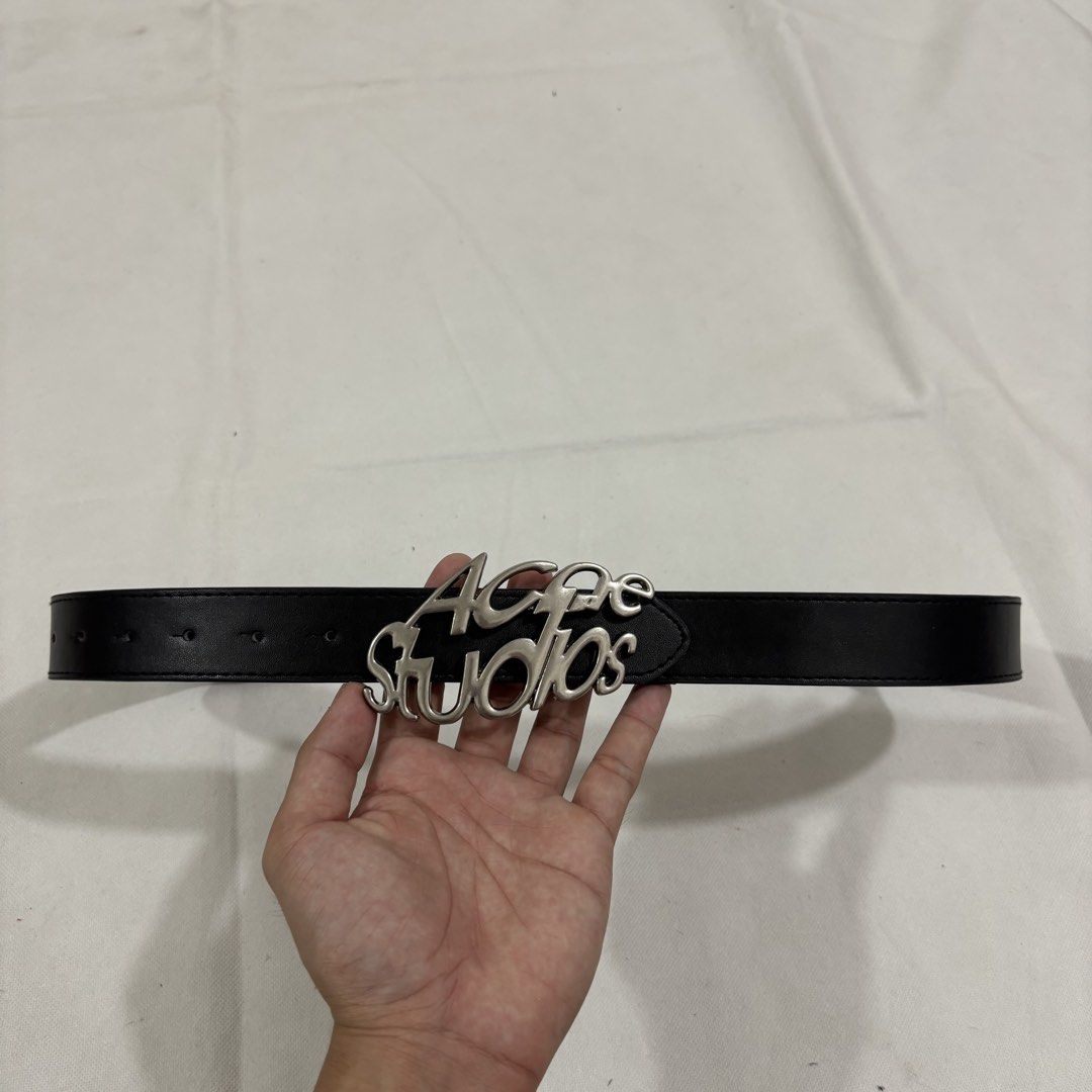 Acne Studios Black Leather Belt with Silver Logo Buckle (Category: Belts) located in Cavite. Submitted by itsayaaa (Listing ID 1459047965, Image 2). Description: - Acne Studios black leather belt - Features the iconic silver logo buckle - Classic and versatile design, perfect for any outfit.