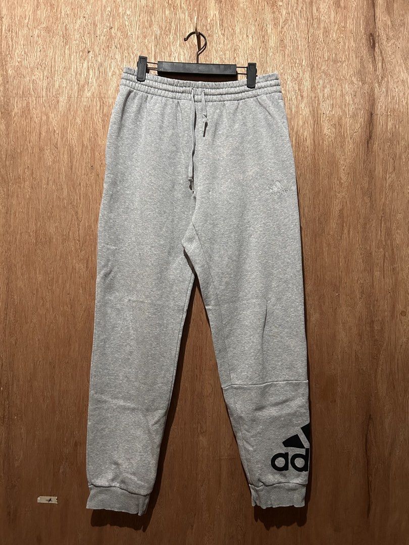 Adidas Essentials French Terry Sweat Pants (Category: Joggers) located in Cabiao. Submitted by alldaythrift (Listing ID 1459146640, Image 1). Description: - Grey Adidas sweatpants - Classic Adidas logo on left leg - Elastic waistband with drawstring - Made in Indonesia - Size L - Ideal for lounging or workouts Adidas Essentials French Terry Sweat Pants Size Large Waistline 28-34 Length 39.5 Excellent condition Minimal stains 570 .