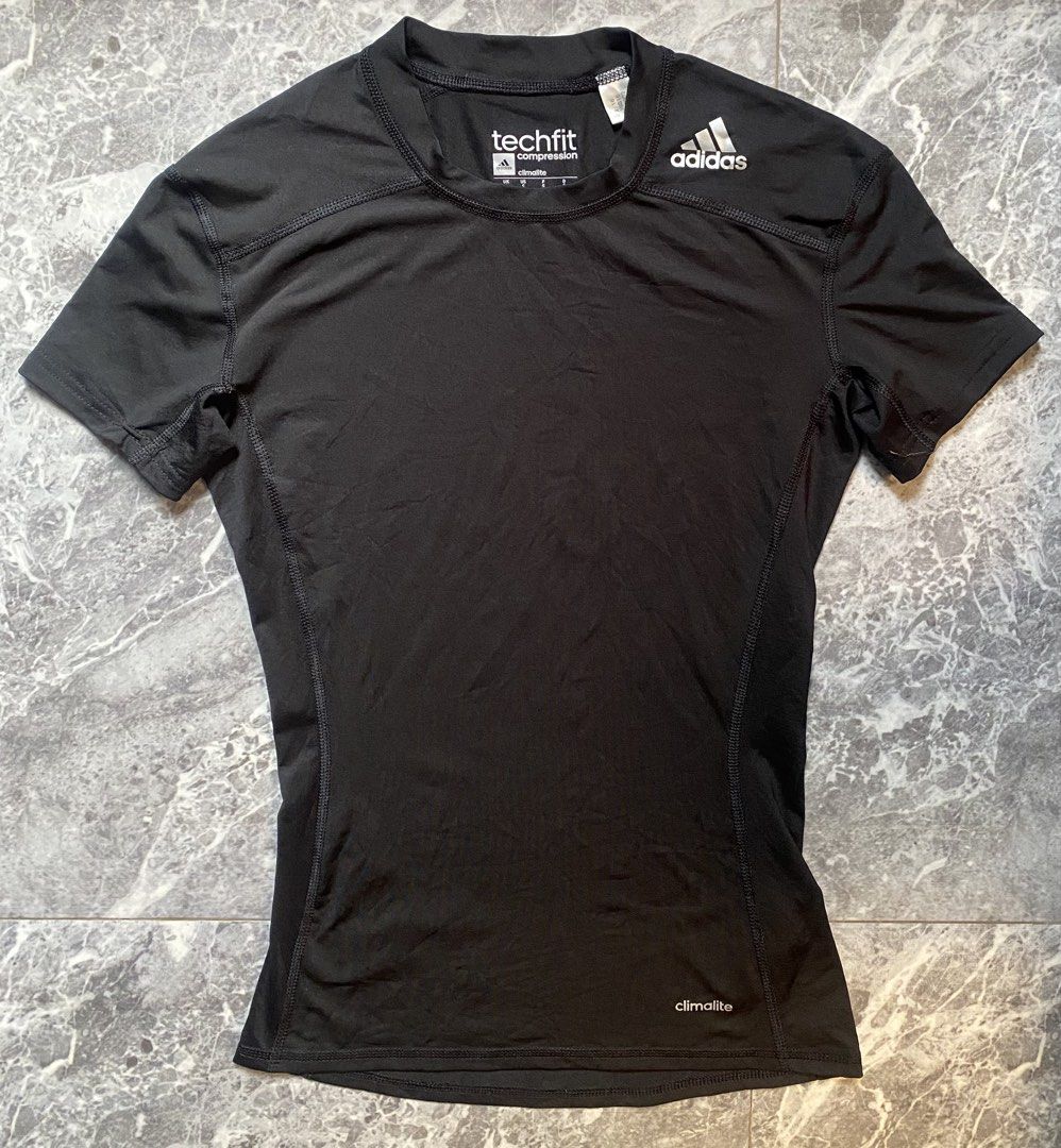 Adidas Techfit Compression Climalite Shirt (Category: Activewear) located in Cebu City. Submitted by Riixi06 (Listing ID 1459150895, Image 1). Description: Size on tag :S BM: 16"laid flat Length: 24" 💯 authentic Colorate 10/10 Inditex intact 📌Fix price ✔✔✔.