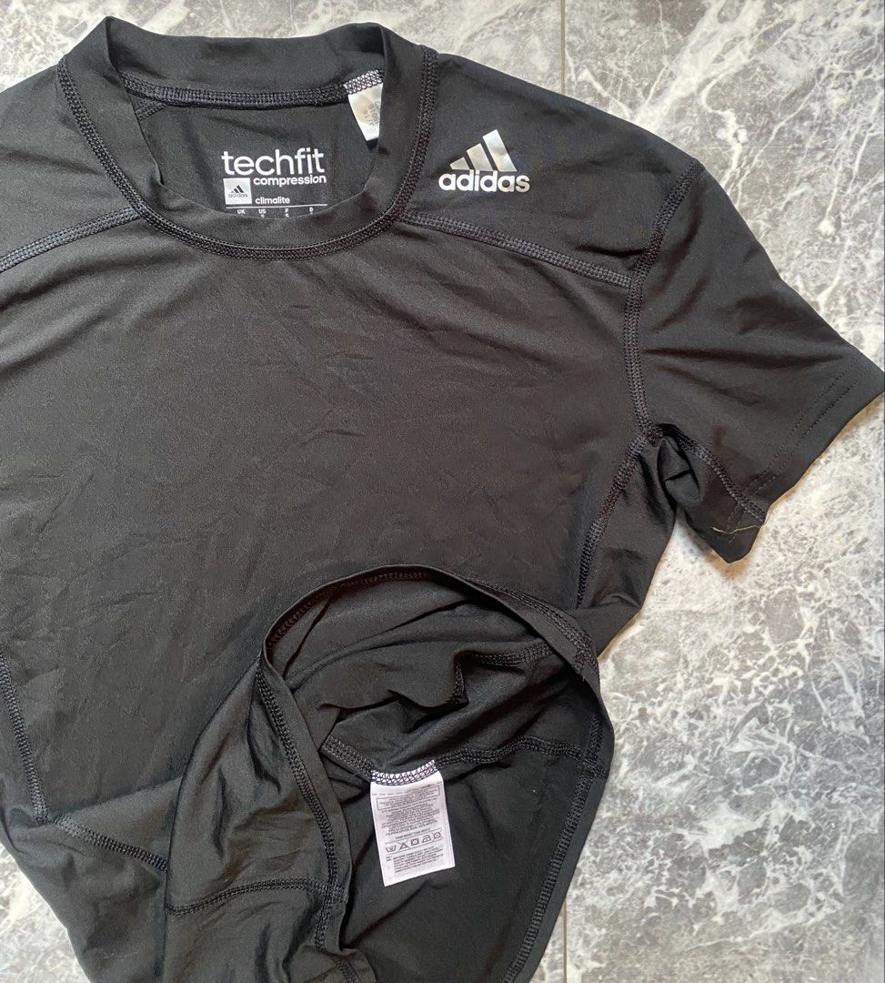 Adidas Techfit Compression Climalite Shirt (Category: Activewear) located in Cebu City. Submitted by Riixi06 (Listing ID 1459150895, Image 3). Description: Size on tag :S BM: 16"laid flat Length: 24" 💯 authentic Colorate 10/10 Inditex intact 📌Fix price ✔✔✔.