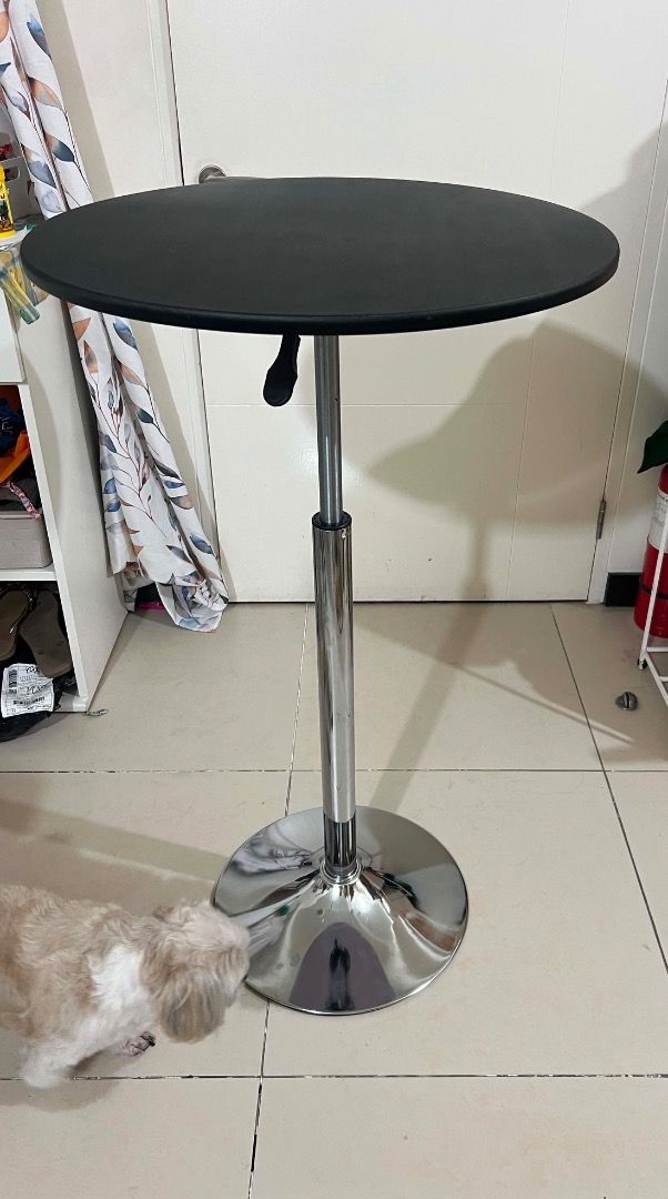 Adjustable Height Round Top Bar Table (Category: Tables & Sets) located in Mandaluyong City. Submitted by lovedbyjaaaam (Listing ID 1459260656, Image 2). Description: - Adjustable height bar table - Round chrome base - Black tabletop - Ideal for small spaces or as a standing desk - Easy to move around.