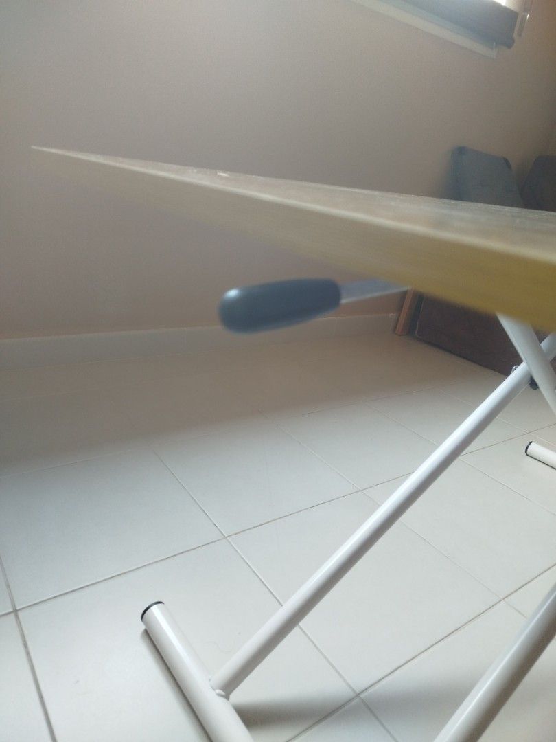 Adjustable Table (Category: Tables & Sets) located in Singapore. Submitted by joshuaalexis (Listing ID 1459159974, Image 2). Description: -brand new - Adjustable height table - Light colored surface - White metal legs - too big for my extremely small living room.. wrong buy 60cmx120cm can adjust the height by just pressing the lever on photo 2 ..no nego it's new ..and already cut the price by quite a lot.. .