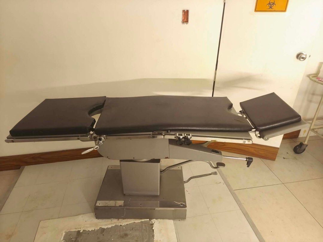 Adjustable Operating Table for Medical Use (Category: Medical Supplies & Tools) located in Marikina City. Submitted by yanee.yv (Listing ID 1459161150, Image 1). Description: - Adjustable operating table - Padded surface with convenient cutouts - Height and position easily adjusted with levers and foot pedal - Perfect for various medical procedures.