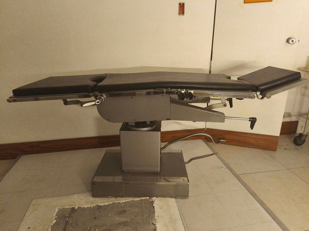 Adjustable Operating Table for Medical Use (Category: Medical Supplies & Tools) located in Marikina City. Submitted by yanee.yv (Listing ID 1459161150, Image 2). Description: - Adjustable operating table - Padded surface with convenient cutouts - Height and position easily adjusted with levers and foot pedal - Perfect for various medical procedures.