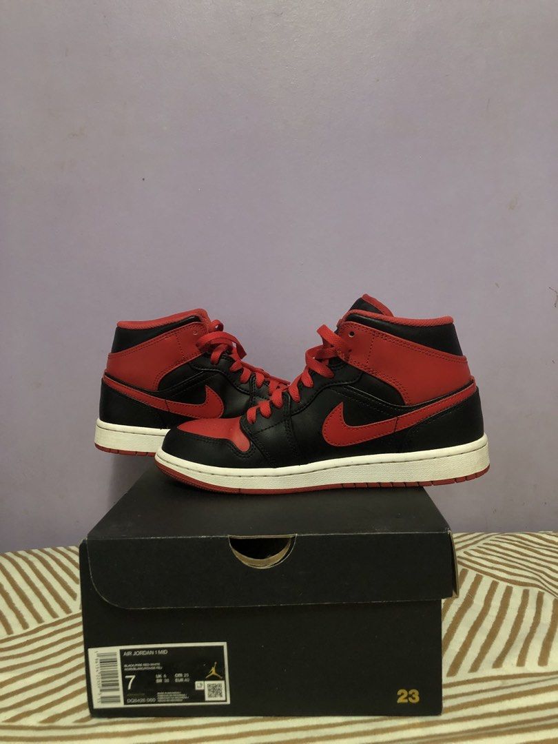 Air Jordan 1 Mid Black Red Size 7 (Category: Sneakers) located in Antipolo. Submitted by Jhedqt. (Listing ID 1459190299, Image 2). Description: - Authentic Air Jordan 1 Mid sneakers - Classic Black and Red colorway - Mid-top silhouette - Size: 7 US Men's - Includes original box Used few times Lalamove only.