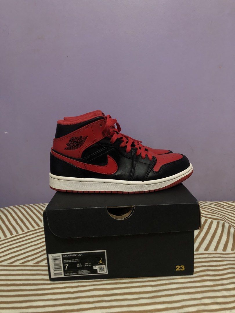 Air Jordan 1 Mid Black Red Size 7 (Category: Sneakers) located in Antipolo. Submitted by Jhedqt. (Listing ID 1459190299, Image 3). Description: - Authentic Air Jordan 1 Mid sneakers - Classic Black and Red colorway - Mid-top silhouette - Size: 7 US Men's - Includes original box Used few times Lalamove only.