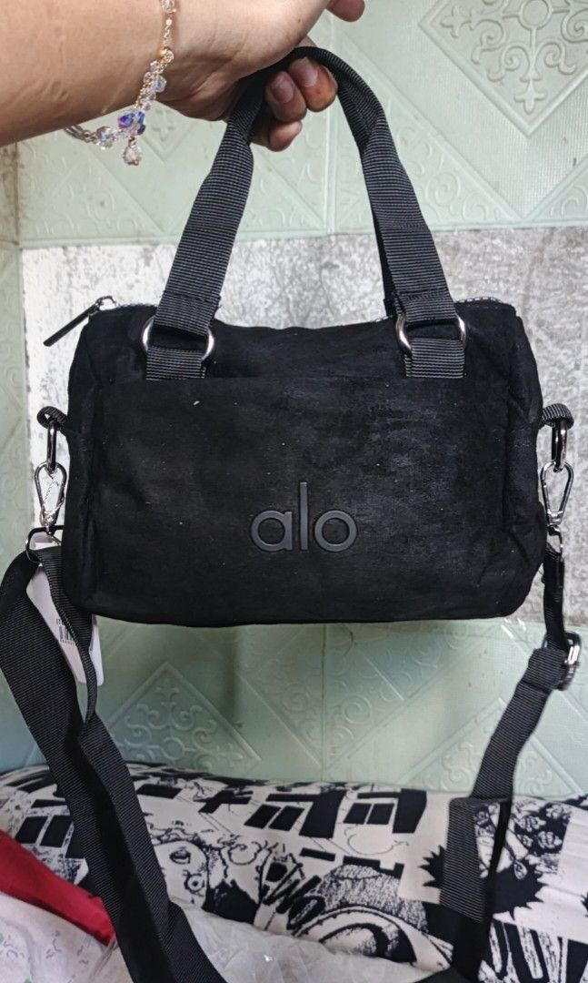 Alo slingbag (Category: Cross-body Bags) located in Las Pinas. Submitted by anne1411 (Listing ID 1459158358, Image 1). Description: small size, ska kasya cellphone,meduim wallet. 3 compartment. suede material..