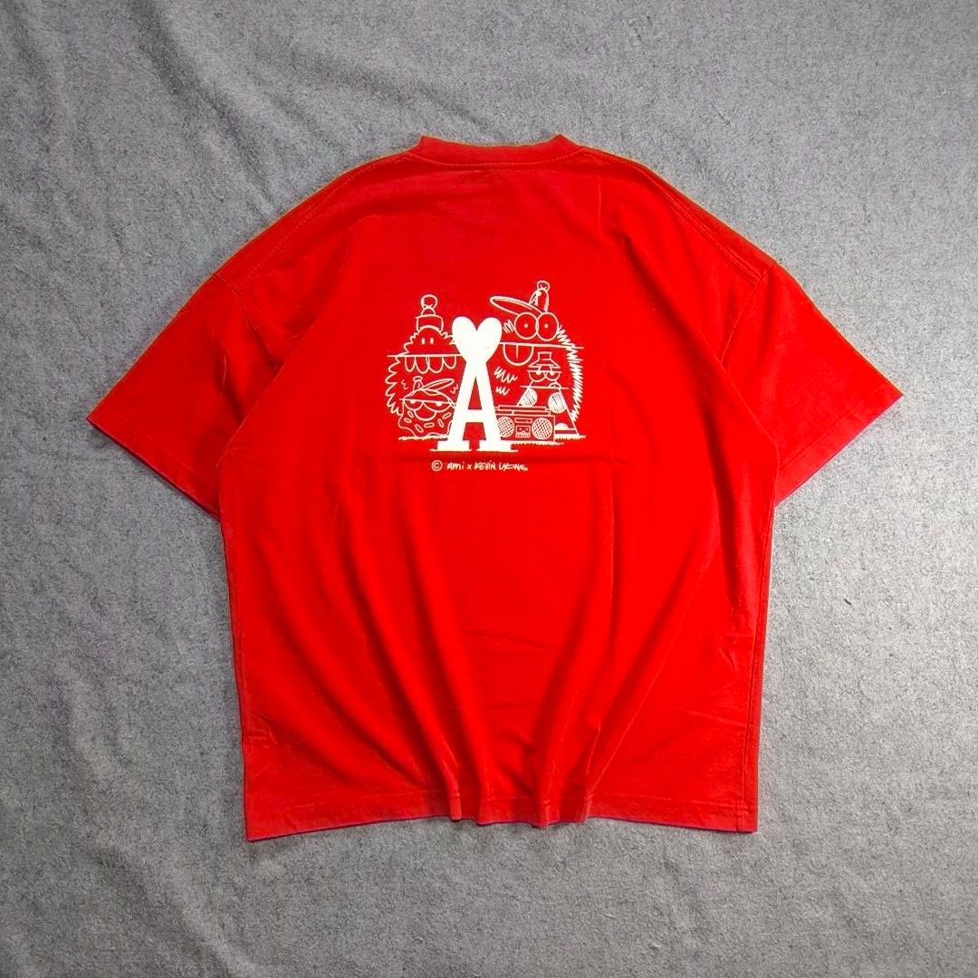 Ami X Kevin Lyons Graphic Shirt (Category: Tshirts & Polo Shirts ) located in Manila. Submitted by shykes_26 (Listing ID 1459094190, Image 2). Description: Dimensions Width - 25 Length - 30 Size on tag - L Issues - Minimal hairlines.