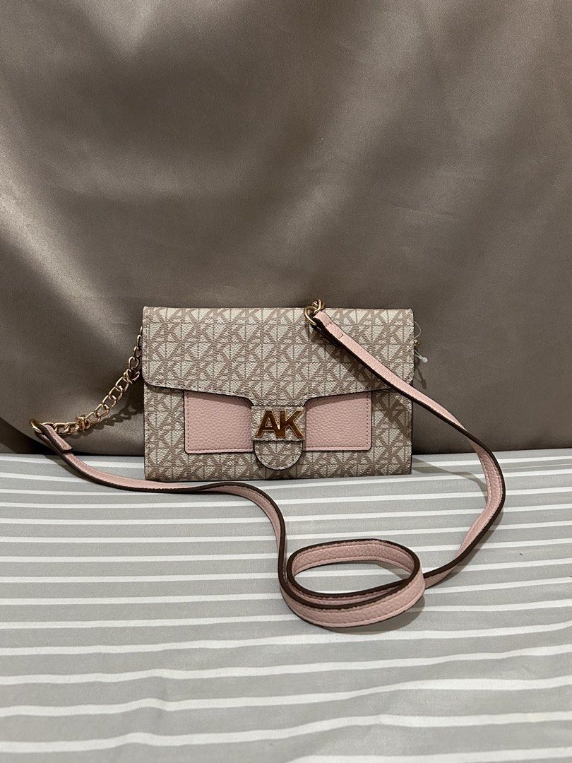 Anne Klein Wallet Clutch with Chain Strap (Category: Luxury Bags & Wallets) located in Pasig City. Submitted by krishnasingh2020 (Listing ID 1459270677, Image 1). Description: Wallet sling -all details are already posted -in good condition -used twice RFS: too girly for me.