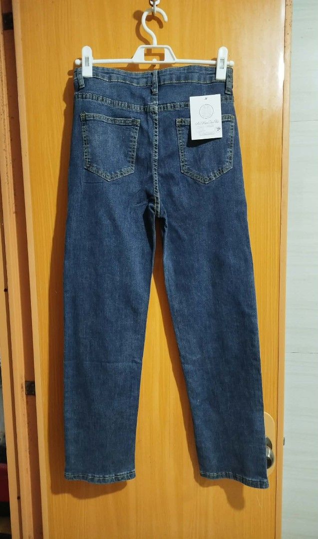 AnWanJuShi Blue Denim Jeans Size 26 (Category: Jeans) located in Quezon City. Submitted by niceoutfits (Listing ID 1459270146, Image 3). Description: - Brand: AnWanJuShi - Type: Blue Denim Jeans - Cut: Straight Leg - Closure: Zip and Button - Pockets: Two back, two front - Size: 26 - Waist : 24-26 - Length : 36 inches - Style: Classic, great for everyday wear.