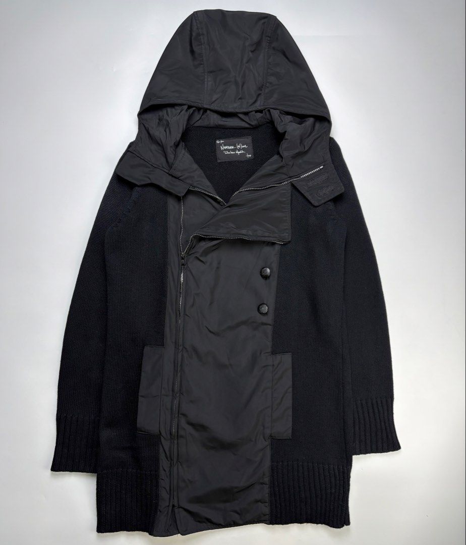 Archive Number Nine Knit Parka Jacket (Category: Coats, Jackets and Outerwear) located in Cavite. Submitted by sc_rcity (Listing ID 1459188639, Image 1). Description: Tagged Size : 2 Like New Sign of Wear No Flaw Made in Japan No Inclusion Featuring a distinctive mixed-media construction, pairing a heavy black ribbed knit body with technical nylon fabric paneling.Features a high-utility, avant-garde design including an off-center diagonal front z
