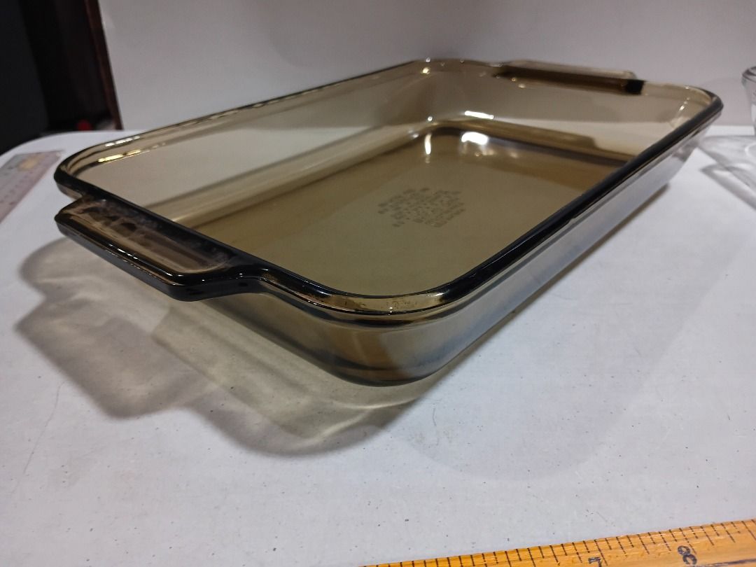 Authentic Vintage Anchor Hocking 3-Quart Rectangular Baking Dish (Model 1040) (Category: Bakeware) located in Marikina City. Submitted by my-an (Listing ID 1459230392, Image 3). Description: Authentic Vintage Anchor Hocking 3-Quart Rectangular Baking Dish (Model 1040) Up for grabs is this stunning, highly collectible transparent Harvest Amber (tinted brown) baking pan. This is an authentic vintage piece manufactured by Anchor Hocking in the USA a