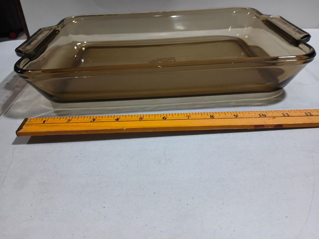 Authentic Vintage Anchor Hocking 3-Quart Rectangular Baking Dish (Model 1040) (Category: Bakeware) located in Marikina City. Submitted by my-an (Listing ID 1459230392, Image 1). Description: Authentic Vintage Anchor Hocking 3-Quart Rectangular Baking Dish (Model 1040) Up for grabs is this stunning, highly collectible transparent Harvest Amber (tinted brown) baking pan. This is an authentic vintage piece manufactured by Anchor Hocking in the USA a