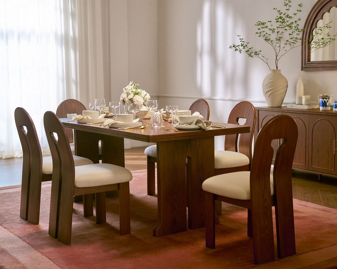 Avan Solid Oak Statement Dining Table (Category: Tables & Sets) located in Singapore. Submitted by homejourney.sg (Listing ID 1459154847, Image 1). Description: A durable, heat- and scratch-resistant finish pairs with sturdy bonded wood and wide solid-oak legs for long-lasting use. Available sizes & prices: - 180cm — S$1119 - 225cm — S$1279 Contact: 9131 8299.