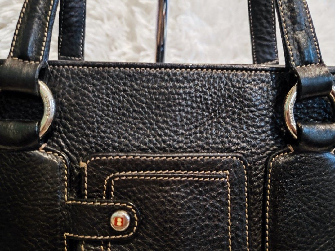 Bally Black Leather Tote Bag (Category: Luxury Bags & Wallets) located in Antipolo. Submitted by brainchelle (Listing ID 1459133366, Image 3). Description: FREE SHIPPING! - Classic black Bally leather tote bag - Pebbled leather texture - Silver hardware details -RIRI zippers - Contrast stitching - Spacious interior, ideal for everyday or work - Comfortable handles - Timeless and versatile design.