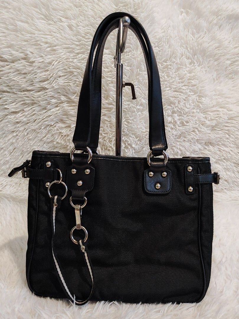 Bally Casma Black Tote Bag with Silver Hardware (Category: Luxury Bags & Wallets) located in Antipolo. Submitted by brainchelle (Listing ID 1447900525, Image 2). Description: FREE DELIVERY. - Classic black tote bag - Features silver hardware details - Sturdy handles - Plenty of space inside for essentials - Great for everyday use or travel - Clean and well-maintained.
