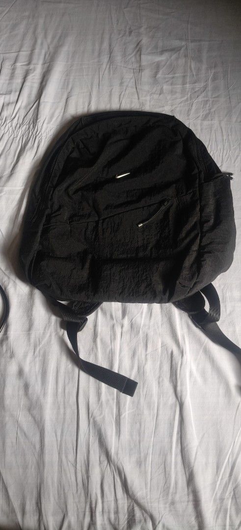 Black Backpack (Category: Backpacks) located in Navotas City. Submitted by olx_002 (Listing ID 1459129539, Image 1). Description: - Nike Stylish black backpack - zippered pocket on the front for easy access - Padded straps for maximum comfort - Ample space inside for all your essentials - Perfect for everyday use or your next travel adventure.