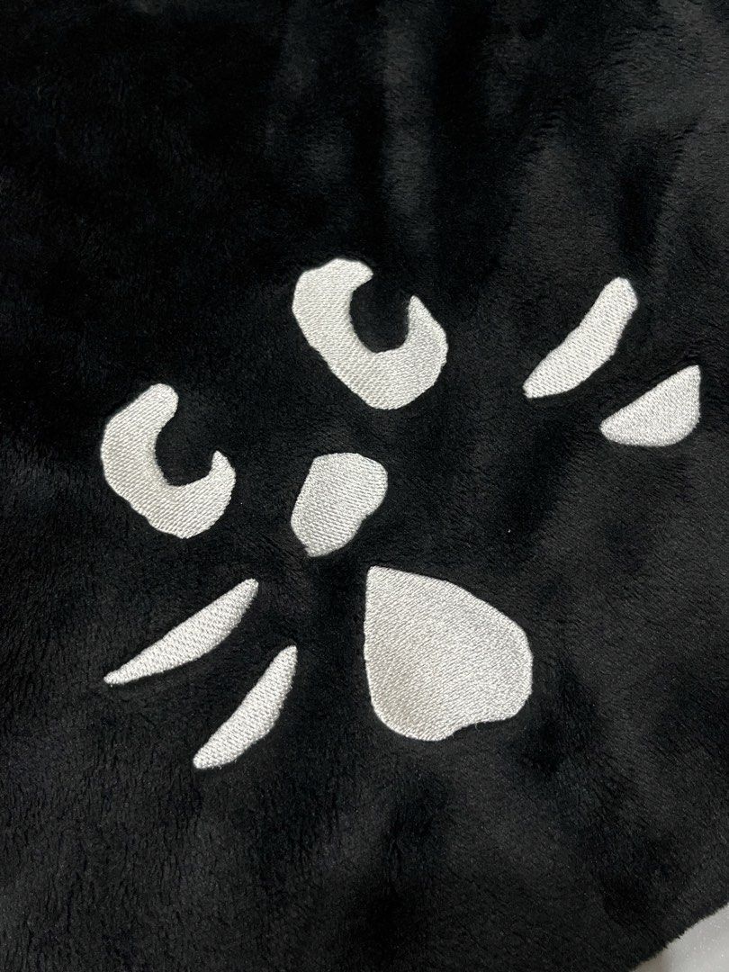 Black Fluffy Cat Face Tote Bag Net Net (Category: Tote Bags) located in Manila. Submitted by jorgemabelin2001 (Listing ID 1459106066, Image 2). Description: - Adorable black tote bag - Made from soft, fluffy material - Features a cute embroidered cat face on the front - Matching fluffy fabric handles - Simple interior lining - Ideal for carrying daily essentials - A must-have for cat lovers!.