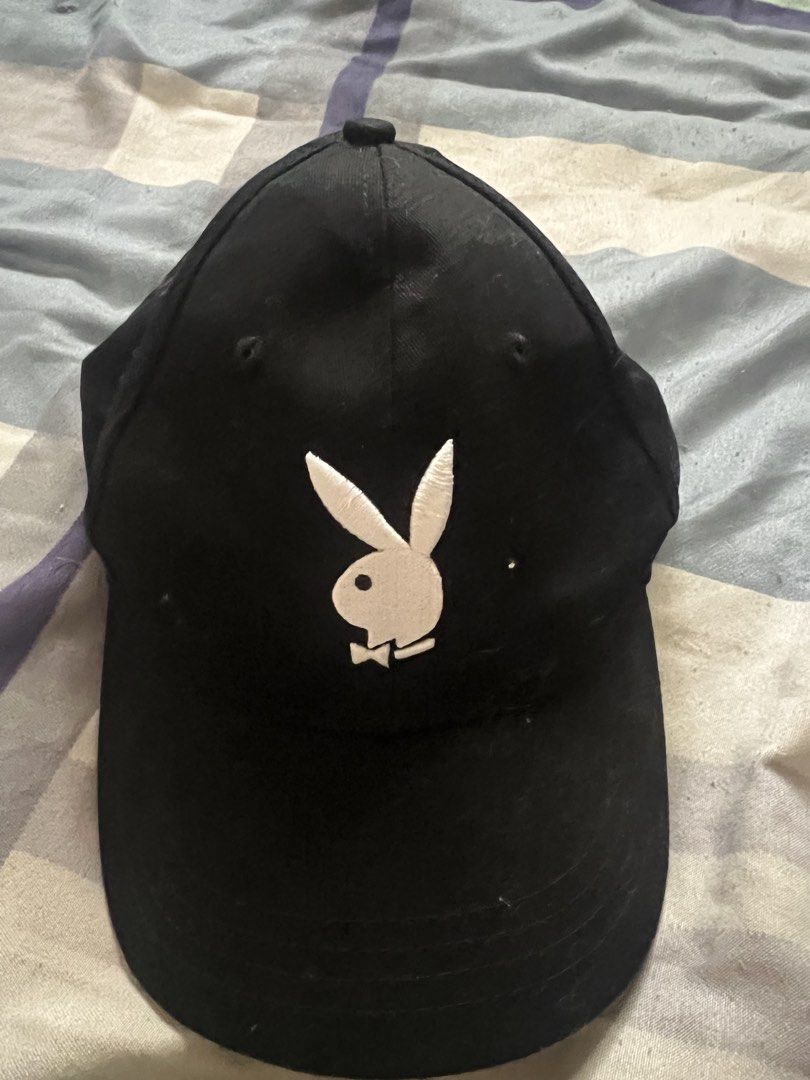 Black Playboy Cap (Category: Caps & Hats) located in Manila. Submitted by janzen007 (Listing ID 1459141870, Image 1). Description: - Classic black baseball cap - Iconic white Playboy bunny logo embroidery - Adjustable strap for a comfortable fit - Stylish and versatile for casual wear - A must-have for Playboy fans.