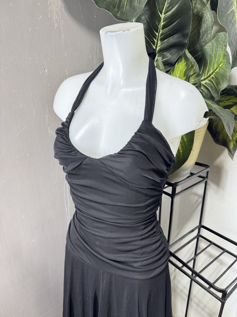 Black Ruched Halter Dress (Category: Dresses) located in Lipa City. Submitted by gozosdanna (Listing ID 1459201681, Image 2). Description: Note: may maliit na tuldok na puti, barely noticeable - Elegant black strapless dress - Flattering ruched detailing on the bodice - Fabric with a subtle sheen - Ideal for a night out Size: XS-S (medyo masikip na po sya sa M).
