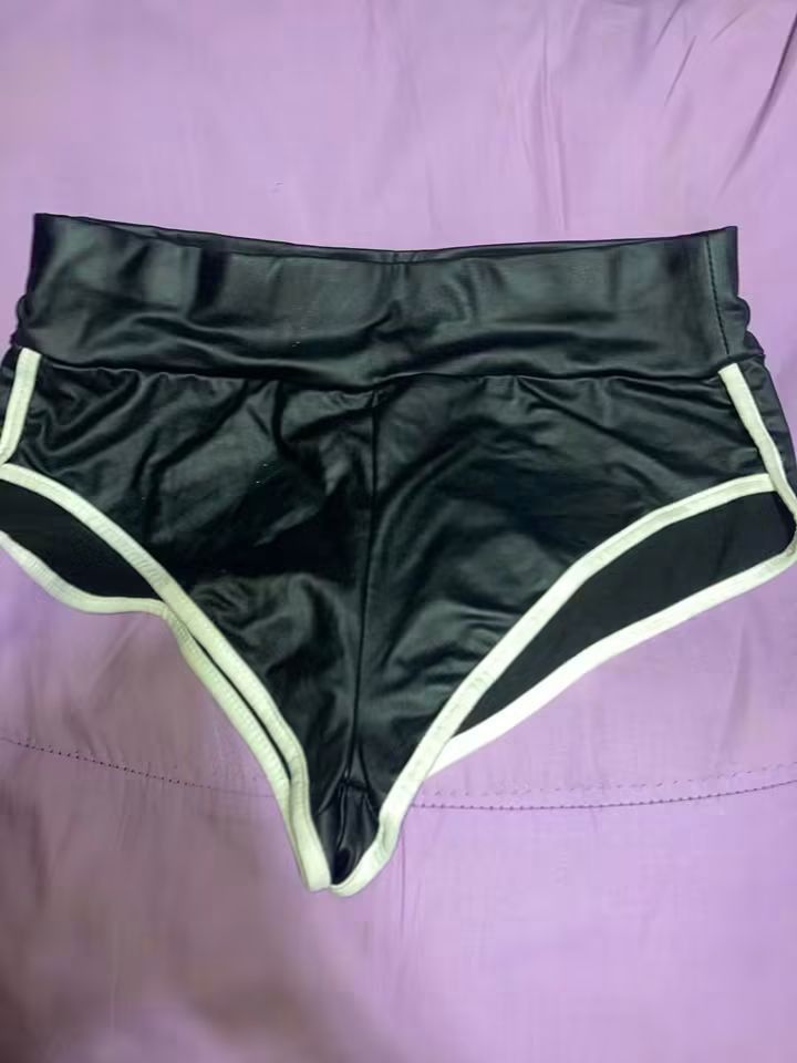Black Shiny Dolphin Shorts with White Trim (Category: Shorts) located in Batangas. Submitted by sheenx.09 (Listing ID 1459167763, Image 1). Description: - s on tag (xs to s) - 26 to 27 (waistline) - Shiny black dolphin shorts 🥰 - White trim along edges 😉 - High-waisted fit 😁 - Comfortable and stretchy material - Versatile: great for lounging or a night out - Super cute style ✅.