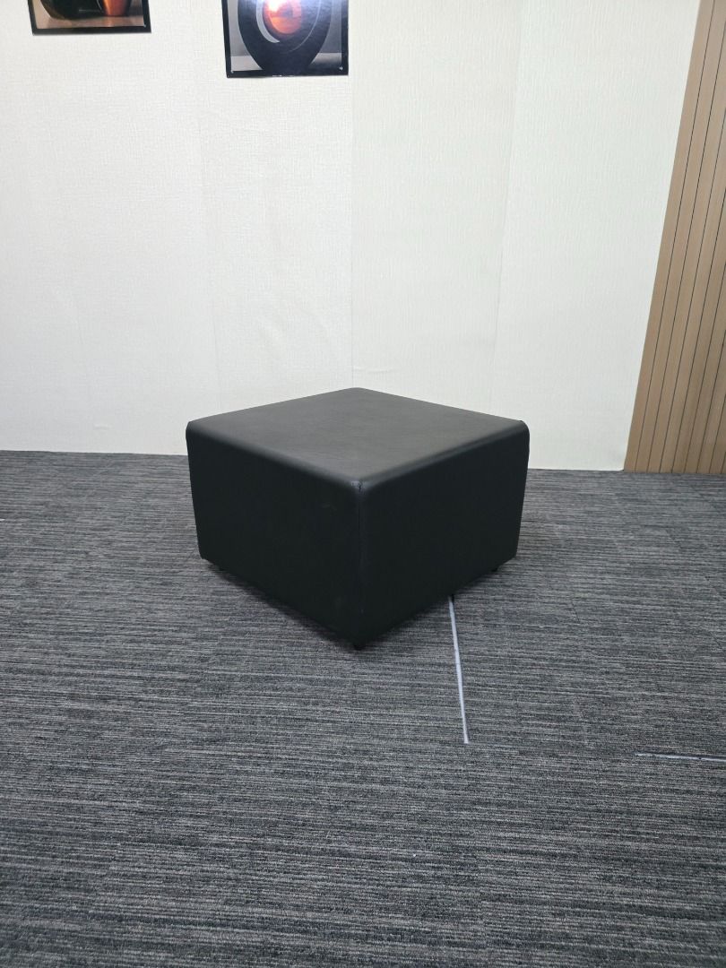 Black Square Ottoman Footrest (Category: Chairs) located in Quezon City. Submitted by kevinmacabata12997160 (Listing ID 1459141137, Image 2). Description: - Black square ottoman - Versatile: use as a footrest or extra seating - Upholstered in durable faux leather - Modern and simple design - Complements any living room or bedroom - Ideal for putting your feet up and relaxing.