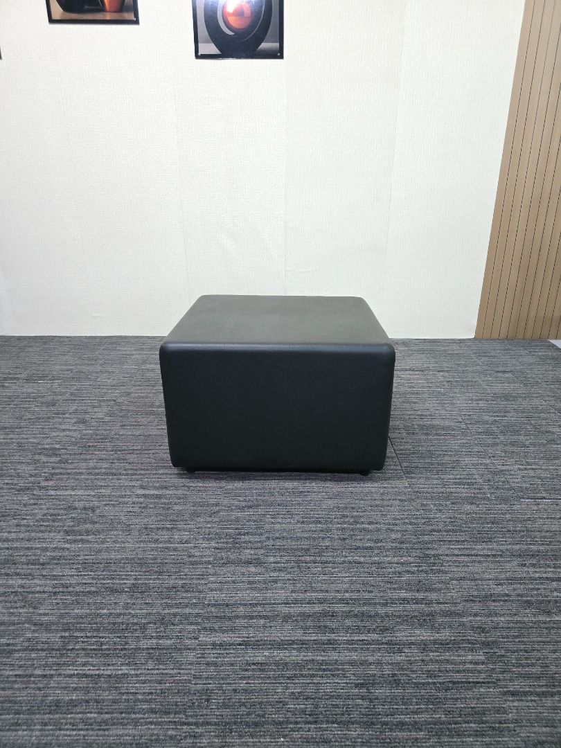 Black Square Ottoman Footrest (Category: Chairs) located in Quezon City. Submitted by kevinmacabata12997160 (Listing ID 1459141137, Image 1). Description: - Black square ottoman - Versatile: use as a footrest or extra seating - Upholstered in durable faux leather - Modern and simple design - Complements any living room or bedroom - Ideal for putting your feet up and relaxing.