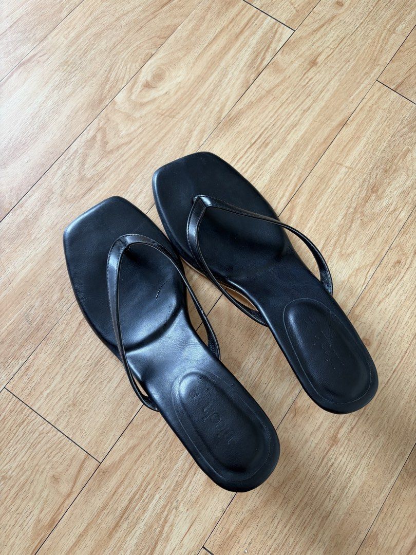 Black Square Toe Thong Heeled Sandals (Category: Heels) located in Muntinlupa City. Submitted by regit_ (Listing ID 1459161962, Image 1). Description: - Stylish black heeled sandals - Comfortable thong style straps - Trendy square toe design - Low heel for all-day wear - Perfect for pairing with various outfits.
