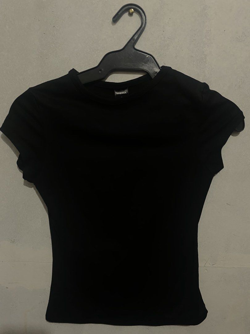 Black top (Category: Shirts) located in Manila. Submitted by nicsubi (Listing ID 1459242800, Image 2). Description: .