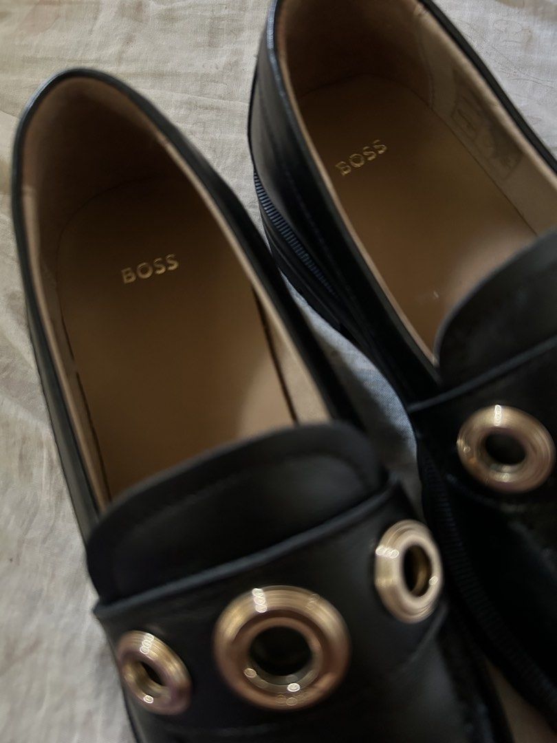 Boss Loafers (Category: Loafers) located in Manila. Submitted by eanaysabel89104 (Listing ID 1459140295, Image 2). Description: BOSS Leather Loafers | Size 36 | Never Used ₱6,000 — negotiable Selling my BOSS black leather loafers, size 36. ✨ Never been used / brand new condition ✨ Genuine leather ✨ Classic black design with gold-tone hardware ✨ Thick lug sole ✨ Clean and well-preserved ❌ No original box Condition: Never worn outdoors; excellent/b