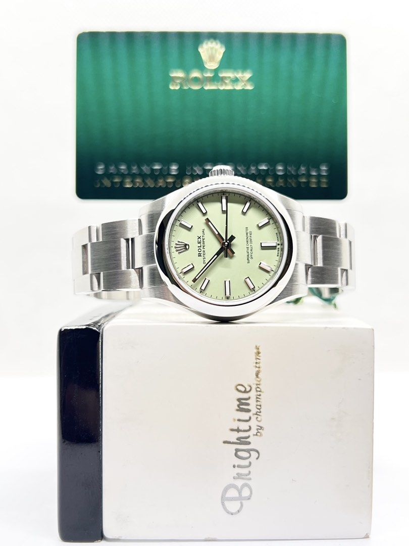Brand New Rolex Oyster Perpetual 31 277200 Pistachio Green Dial Automatic Steel Casing Bracelet ( Nov 25 ) (Category: Watches) located in Singapore. Submitted by brightime (Listing ID 1459184600, Image 2). Description: Brand New Rolex Oyster Perpetual 31 277200 Pistachio Green Dial Automatic Steel Casing Bracelet ** Brand New ** ** Partial Stickers Intact ** Model : 277200 Also known as : Oyster Perpetual 31 Case size : 31mm Dial : Pistachio Gree