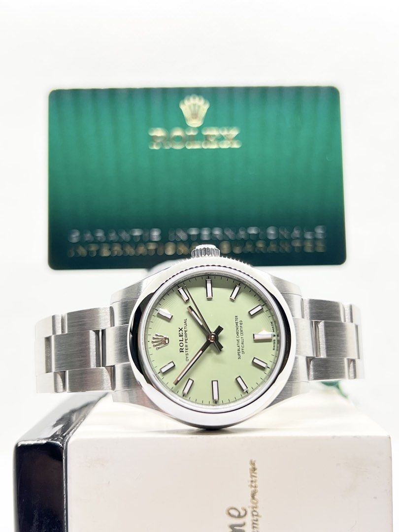 Brand New Rolex Oyster Perpetual 31 277200 Pistachio Green Dial Automatic Steel Casing Bracelet ( Nov 25 ) (Category: Watches) located in Singapore. Submitted by brightime (Listing ID 1459184600, Image 1). Description: Brand New Rolex Oyster Perpetual 31 277200 Pistachio Green Dial Automatic Steel Casing Bracelet ** Brand New ** ** Partial Stickers Intact ** Model : 277200 Also known as : Oyster Perpetual 31 Case size : 31mm Dial : Pistachio Gree