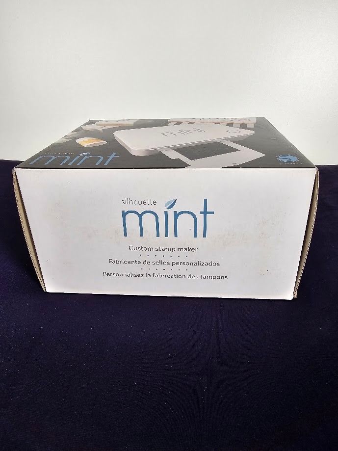 Silhouette Mint Custom Stamp Maker (Brand New Unopened) (Category: Craft Supplies & Tools) located in Caloocan City. Submitted by elleandhermusings (Listing ID 1459267457, Image 3). Description: Silhouette Mint Custom Stamp Maker, brand new and unopened. Never used and original box has never been opened. Includes the original starter package with: Silhouette Mint machine 15×60 mm stamp kit 30×30 mm stamp kit 4 ink colors USB cable power adapter s
