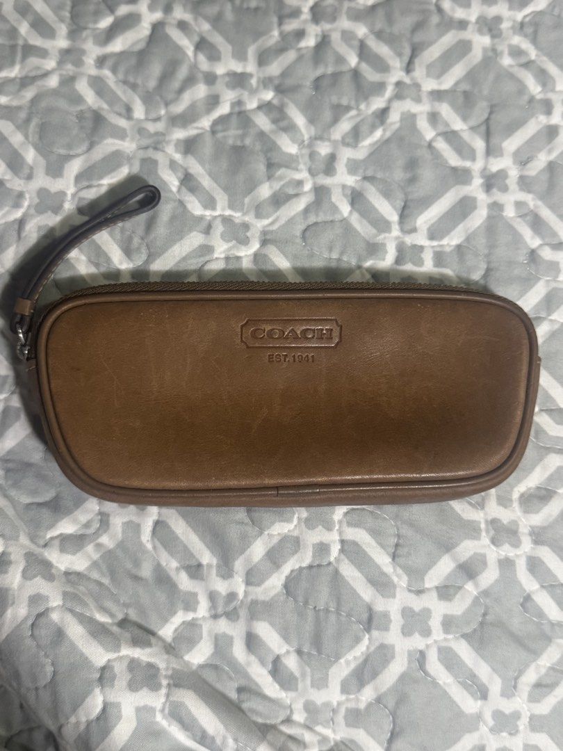 brown leather Coach cosmetic pouch/glasses (Category: Belt bags, Clutches and Pouches) located in Makati City. Submitted by polasale (Listing ID 1459232879, Image 1). Description: Vintage brown leather Coach cosmetic pouch.