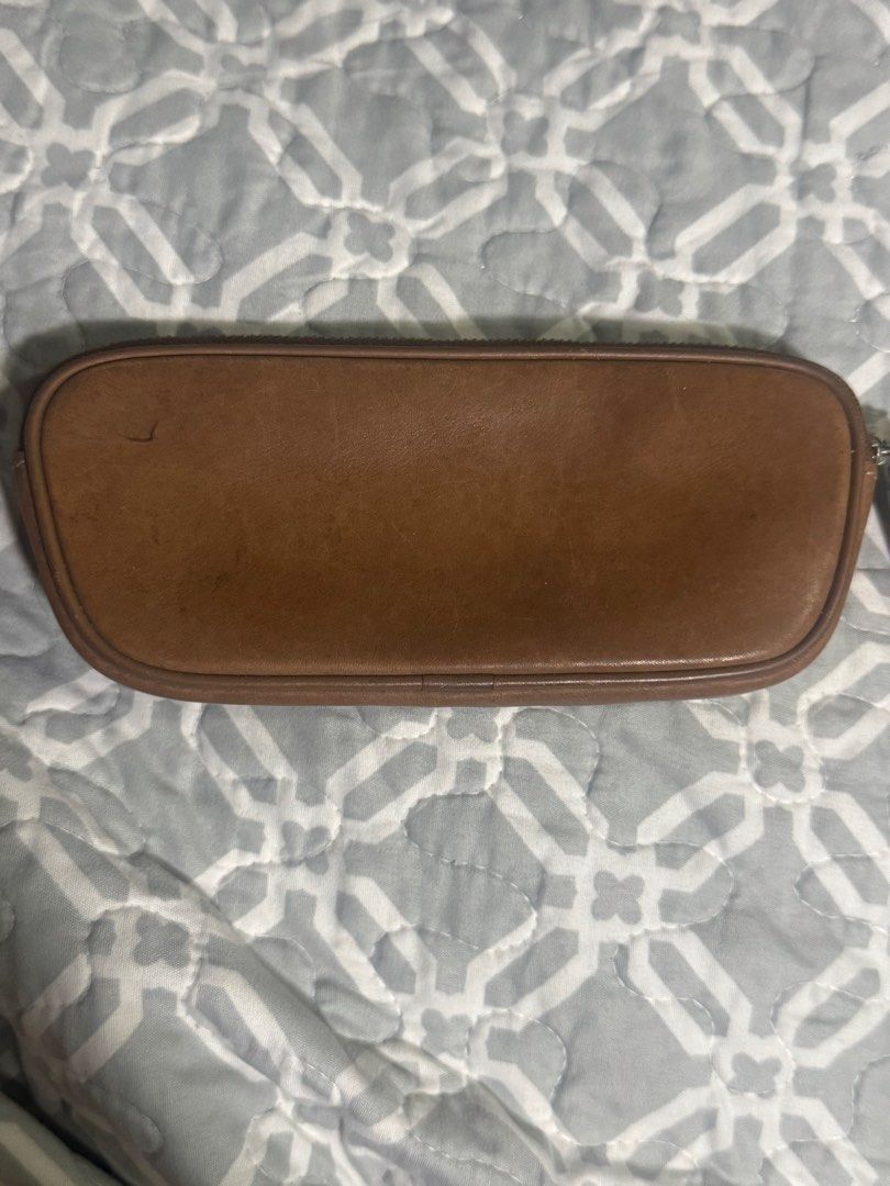 brown leather Coach cosmetic pouch/glasses (Category: Belt bags, Clutches and Pouches) located in Makati City. Submitted by polasale (Listing ID 1459232879, Image 2). Description: Vintage brown leather Coach cosmetic pouch.