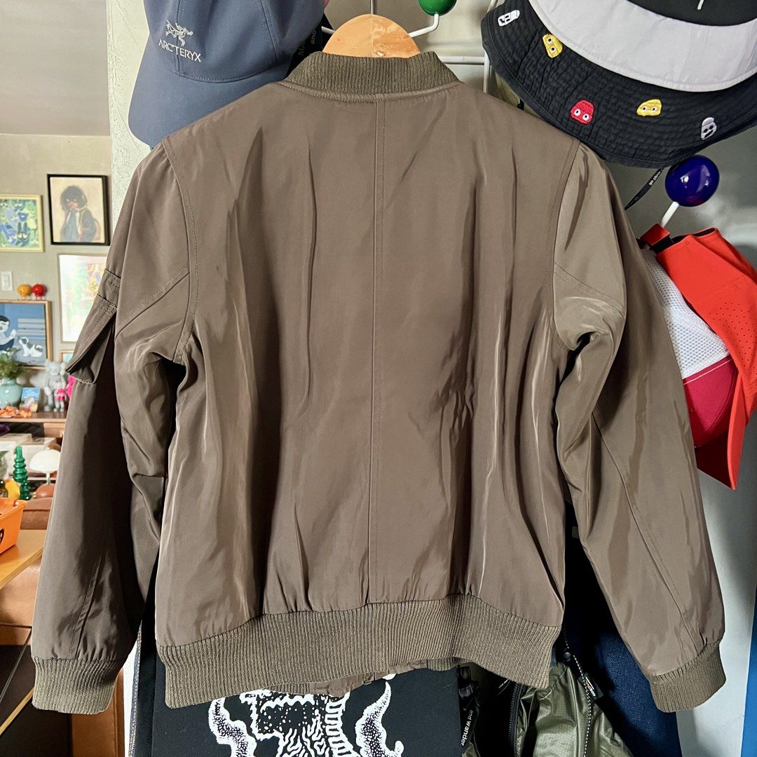 Bomber Jacket with Quilted Lining (Category: Coats, Jackets and Outerwear) located in Makati City. Submitted by jmseduardo (Listing ID 1459152974, Image 2). Description: Tagged size: M 19x21 Brown greenish .