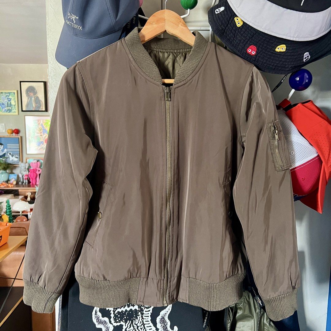 Bomber Jacket with Quilted Lining (Category: Coats, Jackets and Outerwear) located in Makati City. Submitted by jmseduardo (Listing ID 1459152974, Image 1). Description: Tagged size: M 19x21 Brown greenish .