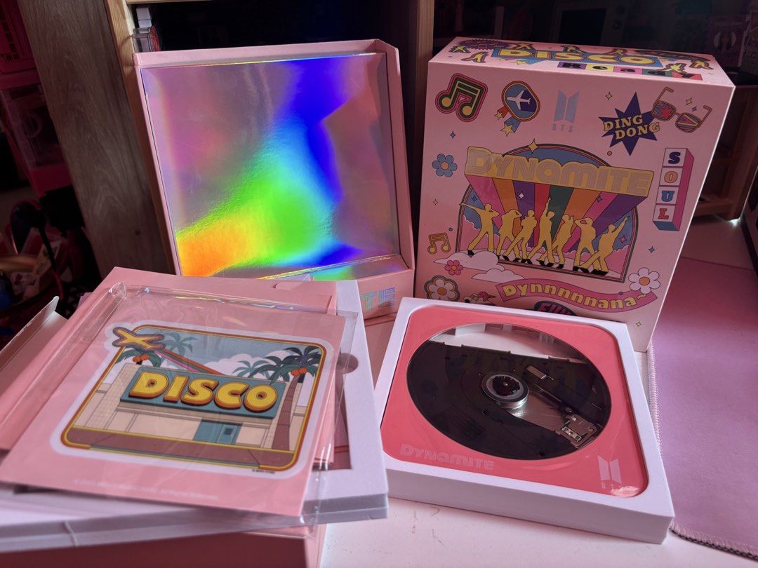 BTS DVD player/writer (Category: Portable Music Players) located in Cavite. Submitted by barbie_g (Listing ID 1459121203, Image 2). Description: Never been used and not a BTS fan. Just bought because its pink! Yup can google the specs, get via lalamove or jnt. Purchase price was 4k+ before selling half the price..