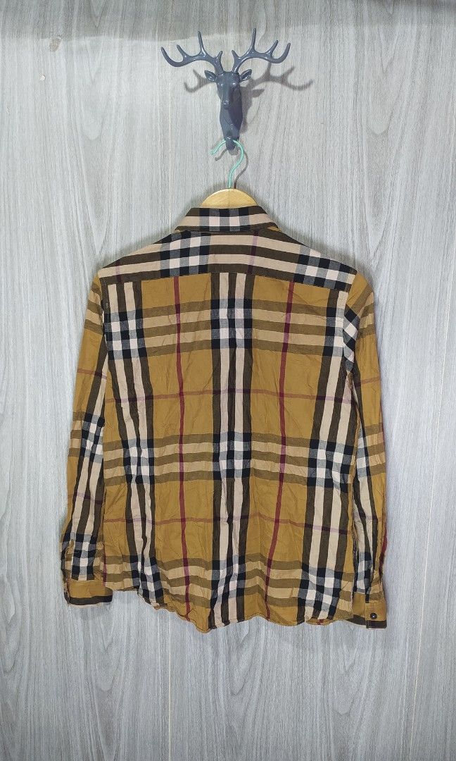 Burberry Button Down Long Sleeved (Category: Formal Shirts) located in Milaor. Submitted by lootinout (Listing ID 1459238885, Image 3). Description: Burberry Button Down Long Sleeved ✅Size: XXXL ✅Width: 20.5 ✅Length: 26 ✅Sleeve: 24 ✅Color Rate: 9.5/10 ✅No Issue ✅Need Wash ✅Location: Bicol Naga City, Camarines Sur ✅Courier: J&T Express/Flash Express ✅MOP: Gcash only.