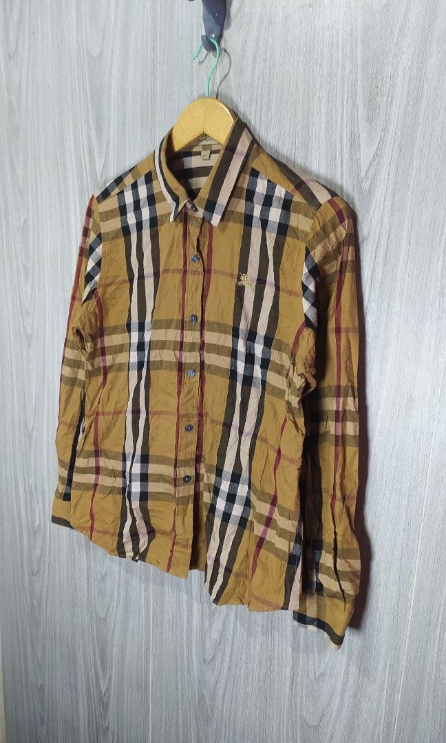 Burberry Button Down Long Sleeved (Category: Formal Shirts) located in Milaor. Submitted by lootinout (Listing ID 1459238885, Image 2). Description: Burberry Button Down Long Sleeved ✅Size: XXXL ✅Width: 20.5 ✅Length: 26 ✅Sleeve: 24 ✅Color Rate: 9.5/10 ✅No Issue ✅Need Wash ✅Location: Bicol Naga City, Camarines Sur ✅Courier: J&T Express/Flash Express ✅MOP: Gcash only.