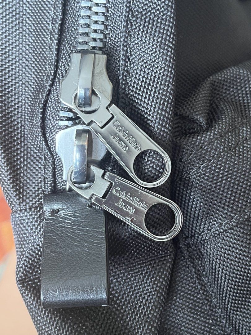 Calvin Klein Backpack (Category: Backpacks) located in Paranaque City. Submitted by shoptaegitbh (Listing ID 1459151217, Image 3). Description: - material is like a thick canvas - with front pocket and inner padded packet - thick adjustable and padded shoulder straps - durable CK zippers - minor rub at the bottom - price is negotiable.