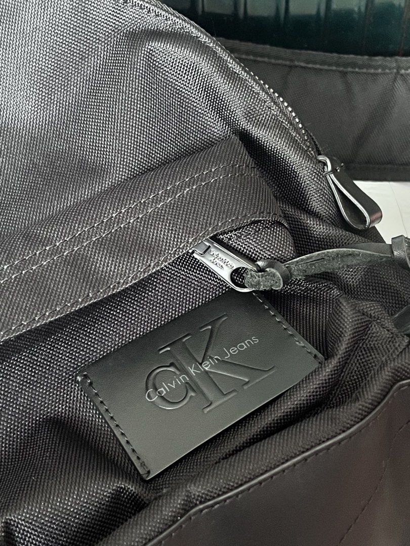 Calvin Klein Backpack (Category: Backpacks) located in Paranaque City. Submitted by shoptaegitbh (Listing ID 1459151217, Image 2). Description: - material is like a thick canvas - with front pocket and inner padded packet - thick adjustable and padded shoulder straps - durable CK zippers - minor rub at the bottom - price is negotiable.