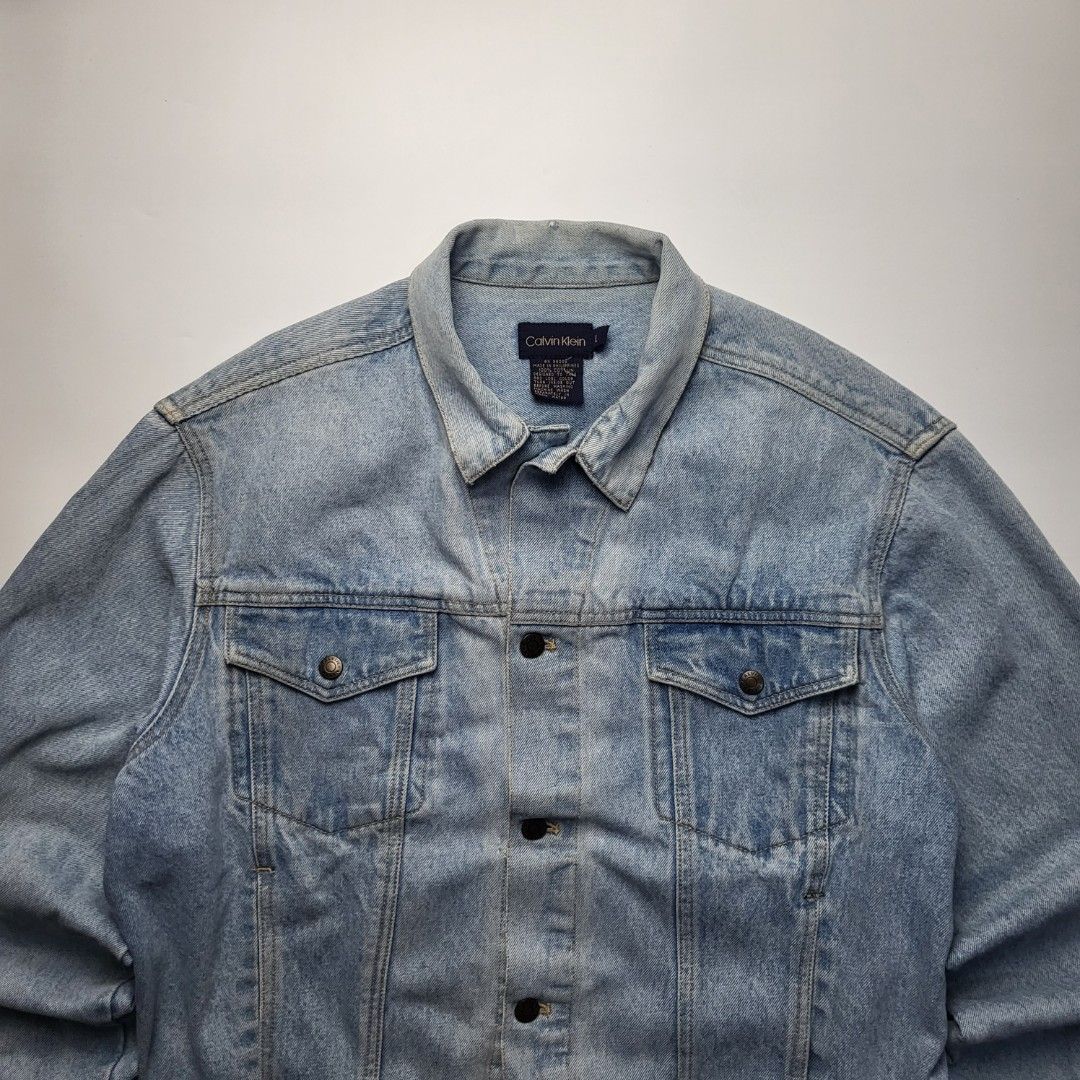 Calvin Klein Light Wash Denim Jacket Size L (Category: Coats, Jackets and Outerwear) located in Cebu City. Submitted by plain.gallery (Listing ID 1459231030, Image 3). Description: Washed Denim Jacket (CK) Size: Large - XLarge (super boxy fit) 👇Dimention (in inches)👇 Width: 25 Length: 24.5 Color rate: 9.8 Condition: 9.8 Issues: none.