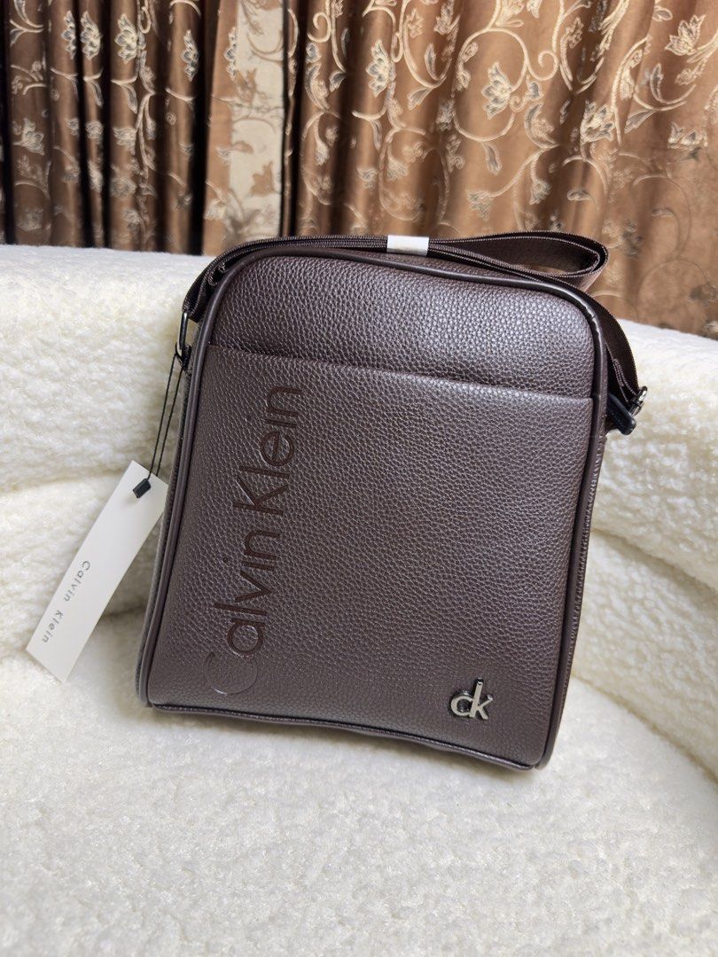 Calvin Klein Men’s Messenger Bag (Category: Sling Bags) located in Binmaley. Submitted by amayscollections (Listing ID 1459174294, Image 1). Description: SUPER SALE MPO MEN’S C@Lv!n kL€!nMESSENGER BAG❣️ ₱399Only 💸 palugi sale 599 reg.price magkano nalang ngayon perfect pangregalo ganda nyan sa personal!🤞🏻👌🥺 YES to C0D✅ add 70 only.🔥 Pm 📩 Disclaimer: ‼️ This Page is not Associated or Affiliated with any of this following brands. All Copyrig