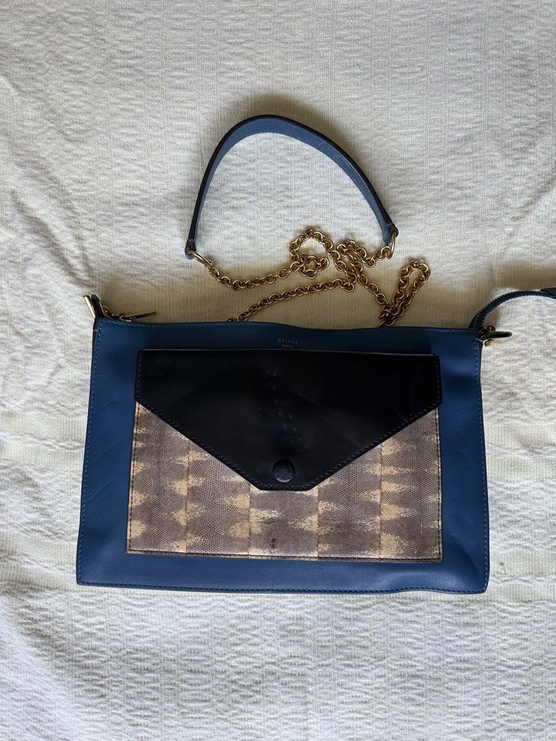 Celine Pocket Envelope Leather Chain Pouch (Category: Cross-body Bags) located in Lipa City. Submitted by bagabonds (Listing ID 1459106227, Image 1). Description: - The chain marked the body, see photos for reference - NGA but cross referencing online it feels like its authentic - with code inside Can send more photos :) .